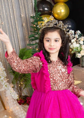 Side view of glitter tulle dress for girls with long sleeves and flowing skirt.