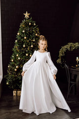 Side view of girls' Ivory Satin Flower Dress with long sleeves
