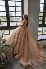 Back view of luxury champagne flower girl dress with button closure