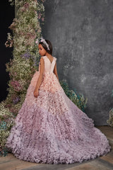 Back view of pink to lavender ombré ruffled formal gown with zippered back.