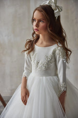 Close-up of lace bodice and intricate details on White Lace Flower Girl Dress