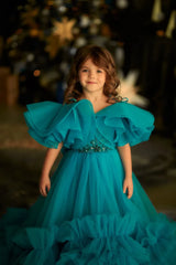 Close-up of lace detailing on aquamarine mini dress for girls

